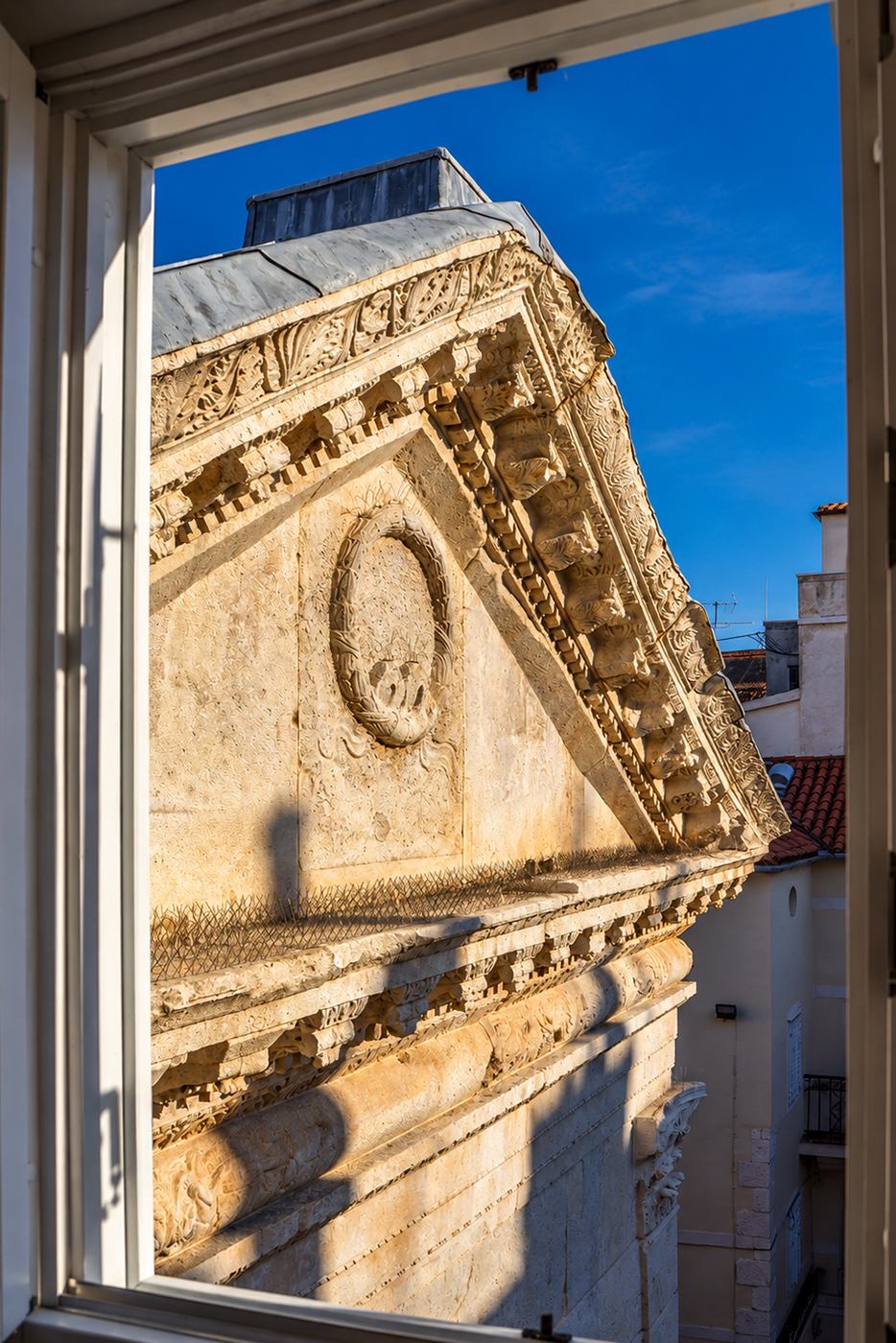Pediment of the Temple of Jupiter viewed from Roman Heritage Apartment in Split